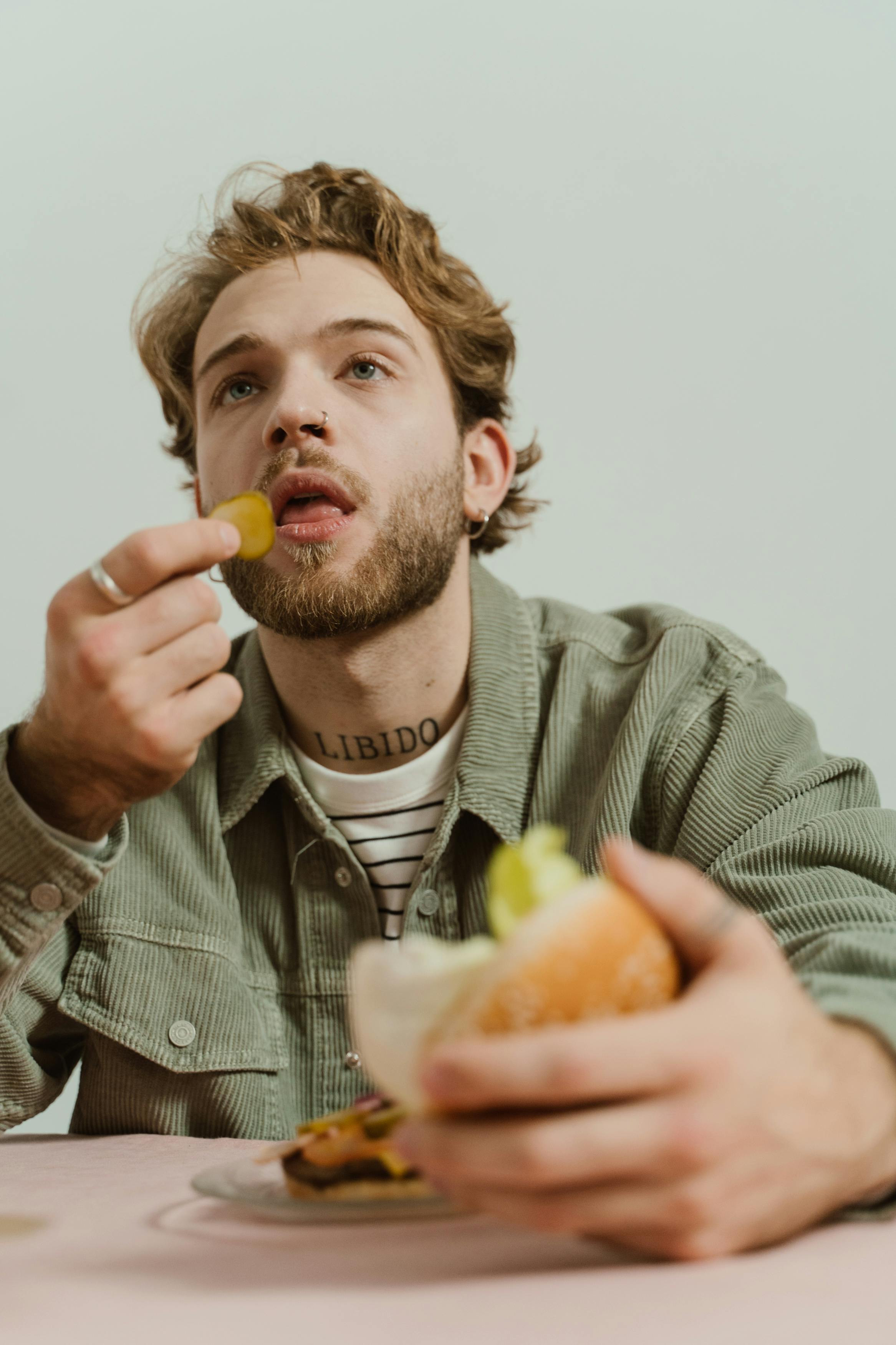 Content man eating | Source: Pexels