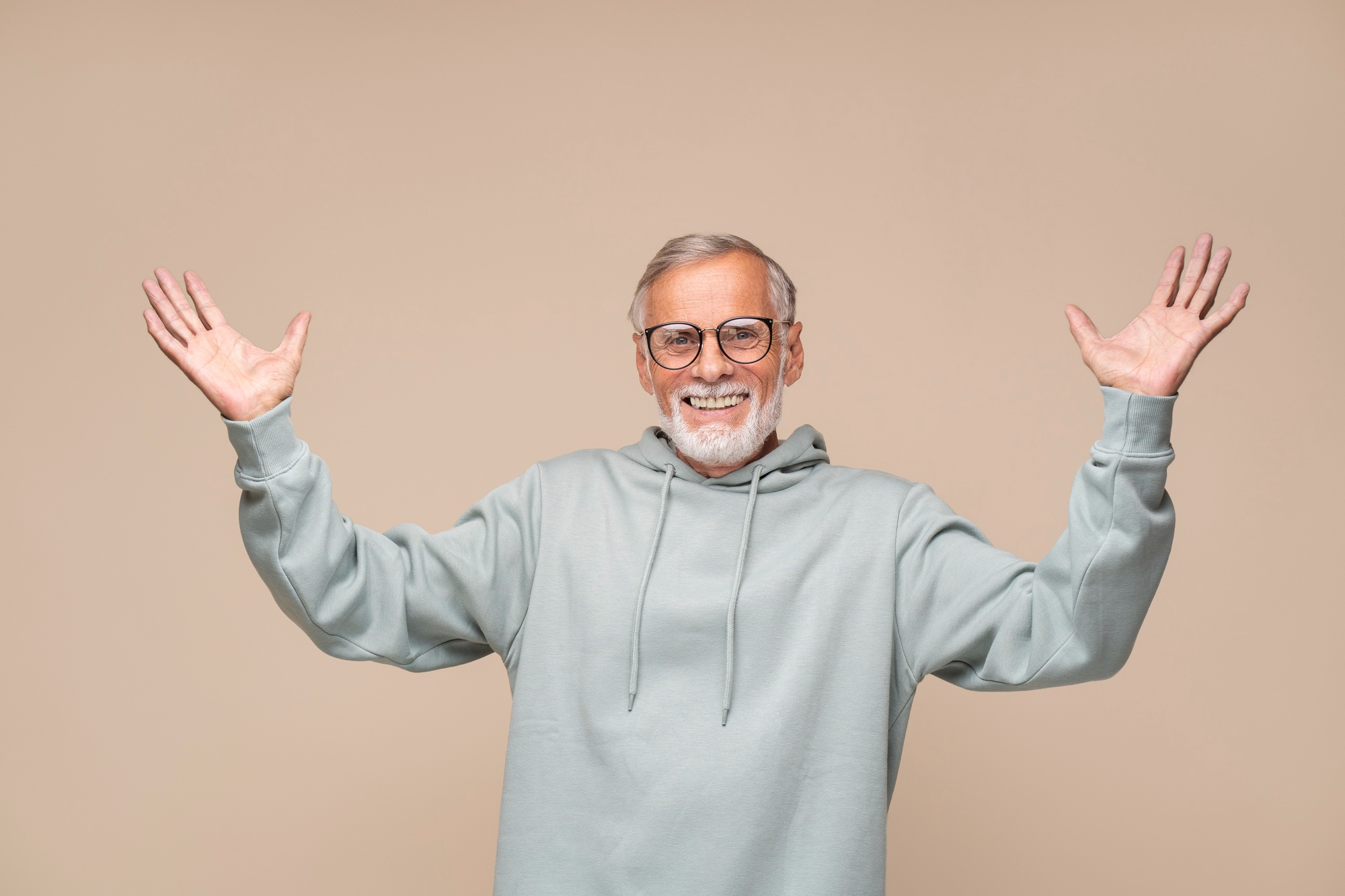 A happy man presenting something to someone | Source: Freepik